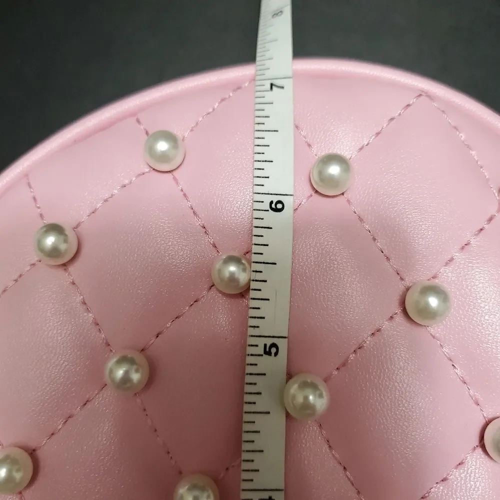 Round pink crossbody with faux pearls
